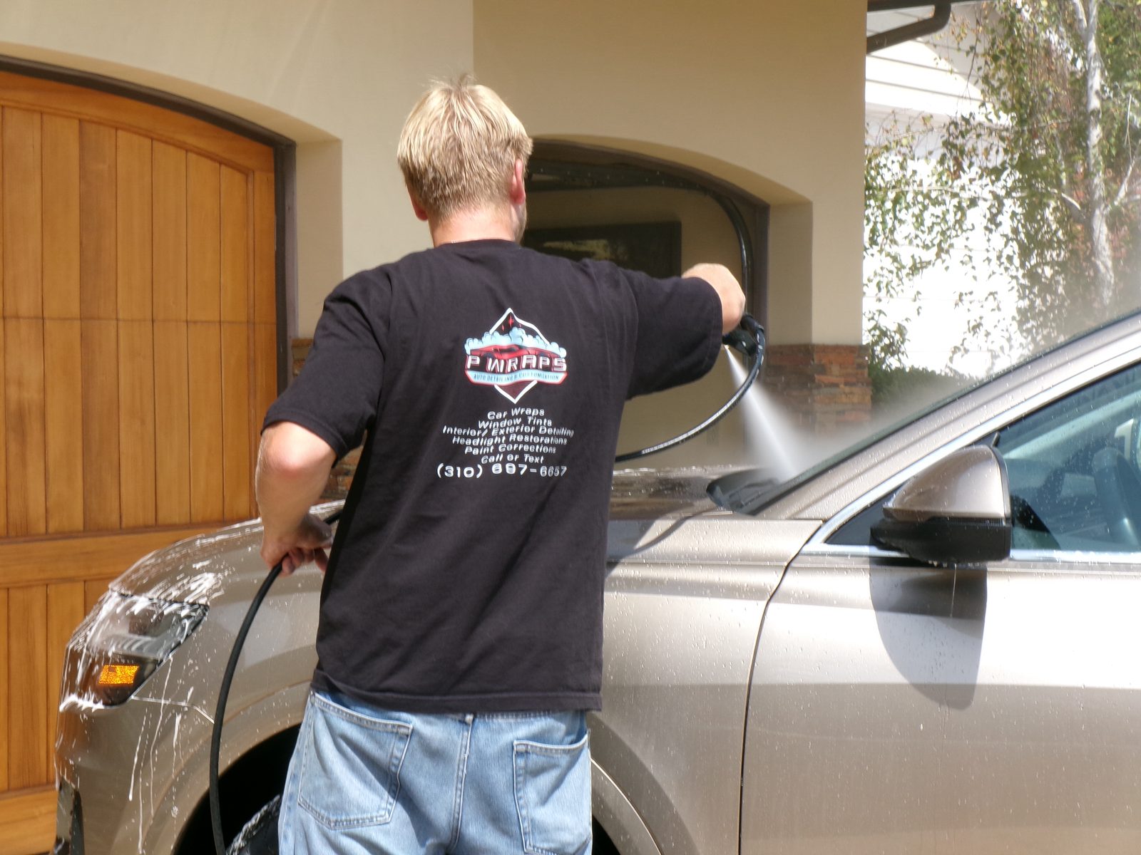 Rinsing down a freshly washed vehicle
